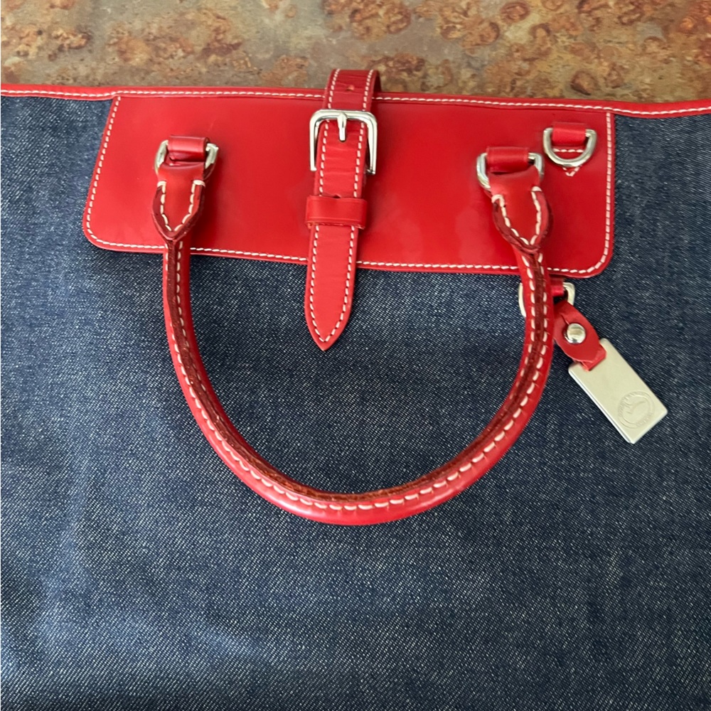 Patriotic Dooney and Bourke denim bag.  Exterior is in great condition